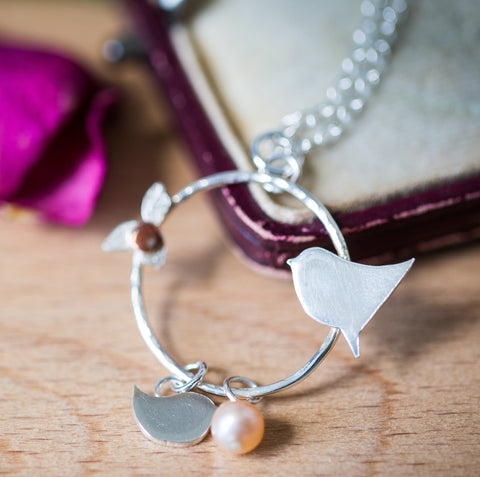Personalised Silver Circle Pendant With Bird And Chick
